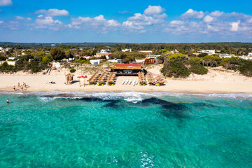 Wall Mural - Punta Prosciutto azure sea water, crystal clear water on beach Punta Prosciutto, Italian Maldives Puglia Italy. Punta Prosciutto in Apulia, one of the most beautiful beaches of Italy.