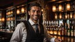 © Arman - smiling man in vest and tie standing at bar with wine glasses