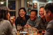 © KirKam - Joyful Evening with Friends Sharing Laughs and Drinks at a Cozy Pub.