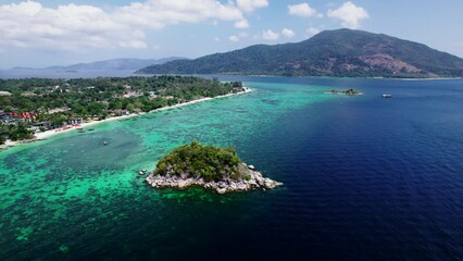 Sticker - Lipe Island and clear water sea with wooden boats take you to tour the island.