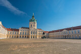 Fototapeta  - Berlin, Germany - July 19, 2022 : front side at Charlottenburg Palace (Schloss) the Baroque summer palace with garden