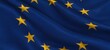 European Union flag waving in the wind. Close up of Europe banner blowing, soft and smooth silk.