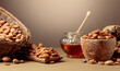 Almond nuts in wooden dishes and honey in a glass jar.