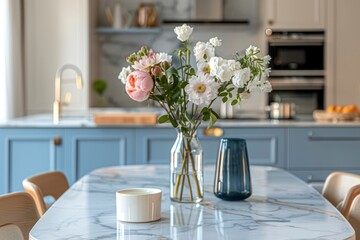 Wall Mural - Empty and clean marble dining table in scandinavian kitchen. Modern monochrome interior with blue drawers on wooden furniture. Tablewear and vases with flowers - generative ai