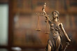 © utah51 - Justice law legal jurisprudence concept. Lady justice with courtroom background.