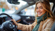 © aekkorn - Happy woman driving her new electric car.