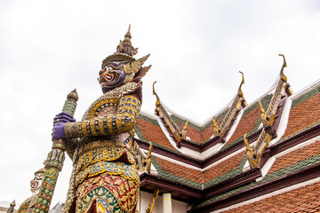 buddhist guardian statue in front of national buddhist temple in bangkok thailand