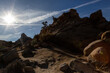 Sunbeams over desert rocks in Joshua Tree Park