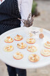 Elegant apple and cheese canapés served at an upscale event