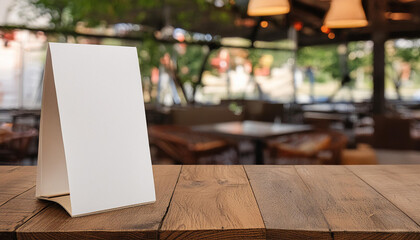 Aufkleber - Three-Dimensional Blank Table Tent Mockup for Eatery Menu, blurred restaurant background