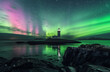 Lighthouse Under the Northern Lights
