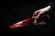 © Di Studio - criminal concept, close up of male hand holding knife in blood over dark background
