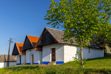 Poster - Group of typical outdoor wine cellars in Vlcnov, Southern Moravia, Czech Republic