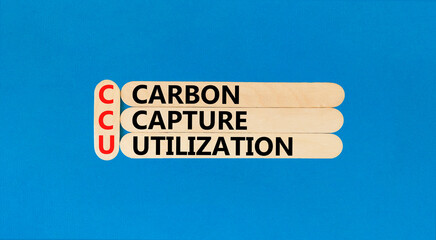 Wall Mural - CCU Carbon capture utilization symbol. Concept words CCU Carbon capture utilization on beautiful stick. Beautiful blue background. Business ecological Carbon capture utilization concept. Copy space