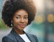 © SolaruS - Smiling Woman With Afro. Generative AI