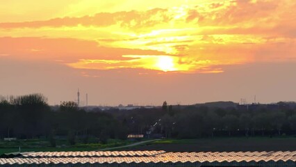 Wall Mural - Golden Sunset Over Hendrik-Ido-Ambacht On IJsselmonde Island In Netherlands. - aerial shot