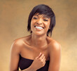 © peopleimages.com - Confidence, aesthetic and portrait of black woman for skincare, beauty and cosmetics on brown background. Happy, face and african girl for self care, dermatology and natural shine on studio backdrop