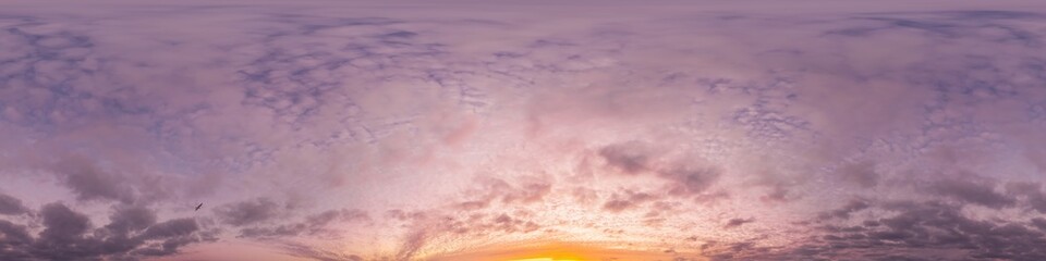 360 panorama of glowing sunset sky with bright pink Cumulus clouds. HDR 360 seamless spherical panorama. Full zenith or sky dome sky replacement for aerial drone panoramas. Climate and weather change.