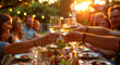 People cheers, making toasts with wine and champagne glasses at a party celebration with friends enjoy a warm summer evening.	
