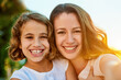 © peopleimages.com - Smile, mother and girl for selfie with portrait in outdoor as family for picture with embrace, bonding and love for memory. Happy, parent and child on vacation for childhood in spring for memory