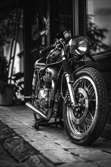 Poster - Classic black and white image of a motorcycle, suitable for various design projects