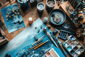 Poster - Various art supplies neatly arranged on a wooden table. Perfect for art and craft projects