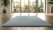 Empty yoga mat on wooden floor in a bright room. Wellness and mindfulness concept.