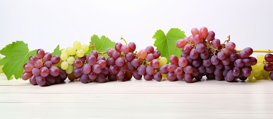 Aufkleber - A copy space image of delicious sweet grapes arranged on a white wooden table