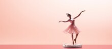 A Ballerina Girl Figurine Elegantly Displayed On A Pink Background Creating The Perfect Greeting Card For Ballet Enthusiasts. With Copy Space Image. Place For Adding Text Or Design