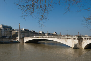 Wall Mural - The Pont de la Tournelle, a famous bridge crossing the Seine in Paris, France .