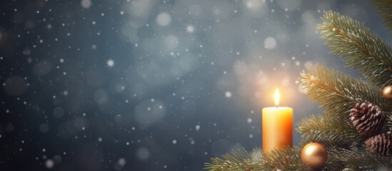 Poster - A beautiful Christmas background with a candle and Christmas tree branches perfect for copy space image