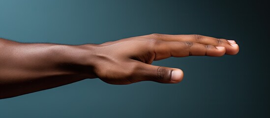 Poster - A close up image of a man s hand displaying something with ample copy space