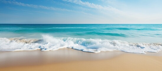Aufkleber - A captivating seascape with a mesmerizing blue sea sandy shore and majestic waves The stunning beauty of nature surrounds this image perfect for wallpaper or background with ample copy space