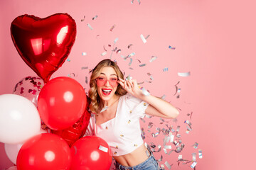 Sticker - Photo portrait of lovely young woman balloons sunglass confetti dressed stylish white garment hairdo isolated on pink color background