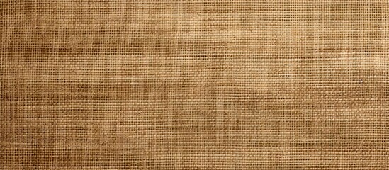 A copy space image of a vintage beige burlap texture serving as a background