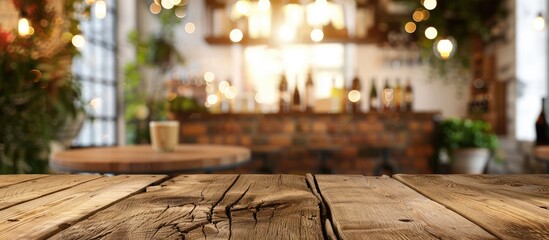 Poster - Background of a wooden table, Shelf in a cafe, Wooden surface in front of a blurred cafe with bokeh lights, Surface for showcasing products, Vacant wooden counter in a blurry white room for mockups,