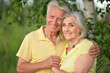 © aletia2011 - Beautiful senior couple posing and hugging in the park