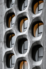 Poster - An office building whose core structure is modeled after a Voronoi diagram, with unique, cell-like windows optimizing natural light,