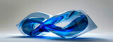 Fototapeta Las - A blue and white sculpture of a wave