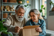 © ArtCraft - Mature couple excitedly opening a box. Highlights the joy of surprise, suitable for lifestyle, relationships, and gifting themes.