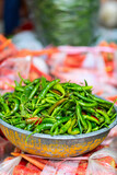 Fototapeta Dmuchawce - Chili peppers at market in India