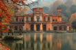 Travel fantasy: autumnal view of antique luxurious villa in Renaissance baroque style on the border of quiet lake waters
