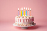 Fototapeta  - birthday cake with 8 eight candles on pastel pink background