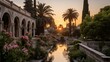 A beautiful garden with a long pool and palm trees at sunset