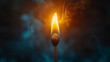 © ParinwatStudio - A match being lit in the dark
