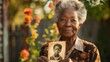 Elderly African American woman displaying old photo of her younger self outside . Concept Portrait Photography, Generational Storytelling, Historical Imagery, Emotional Memories