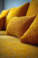 Poster - A close up of a yellow couch with pillows on it, AI