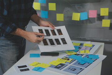 ux Graphic designer creative sketch planning application process development prototype wireframe for web mobile phone . User experience concept.