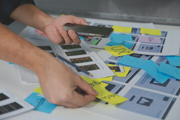 ux Graphic designer creative sketch planning application process development prototype wireframe for web mobile phone . User experience concept.