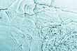 Water waves on blue background. Top view with copy space.
